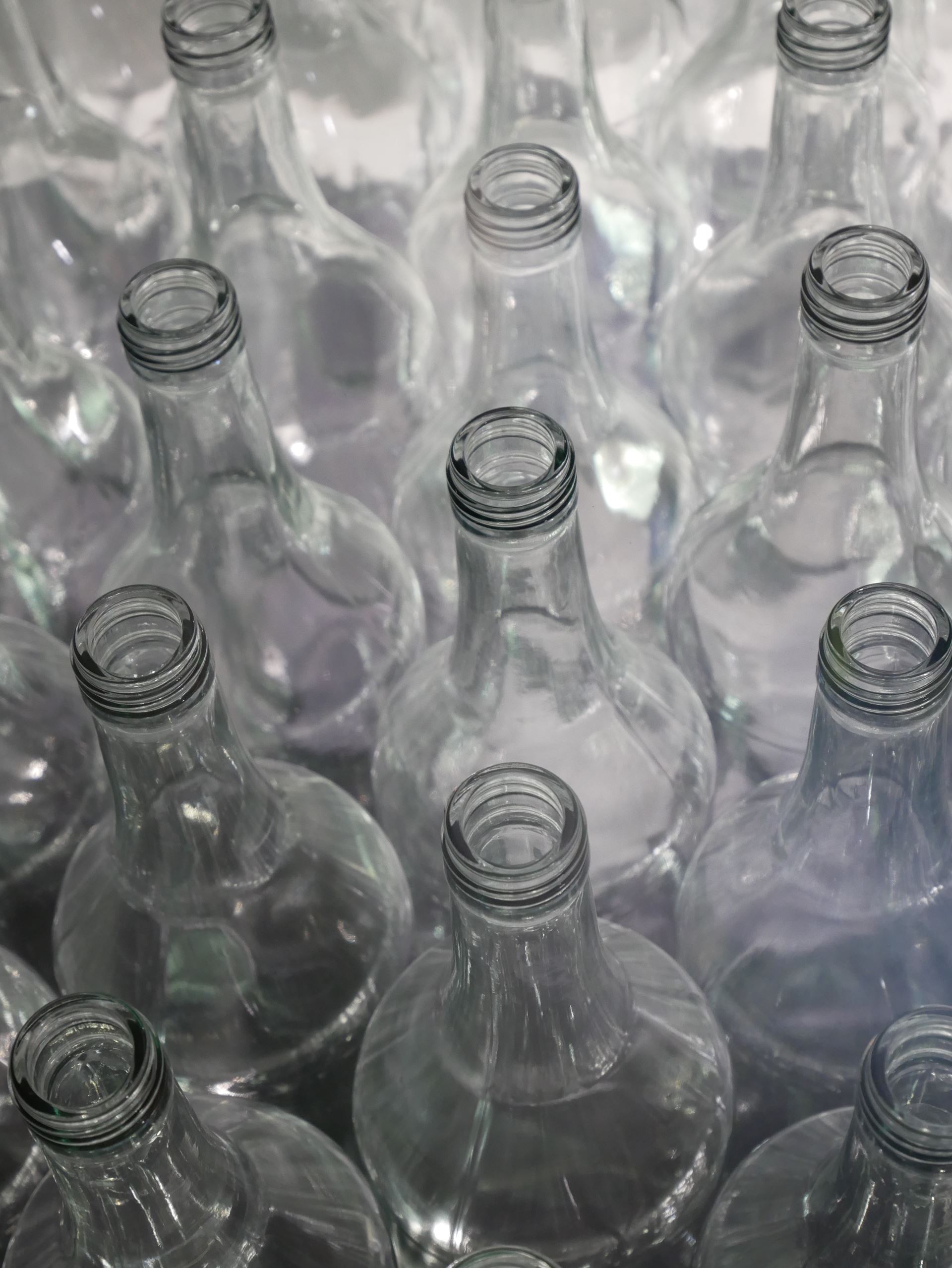 A selection of empty clear glass bottles